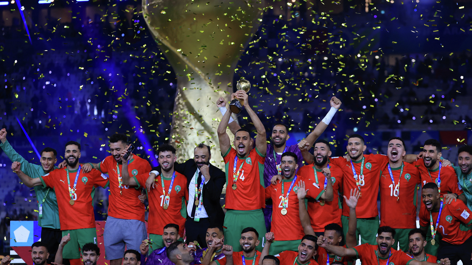 Morocco players and fans celebrate winning Arab Cup