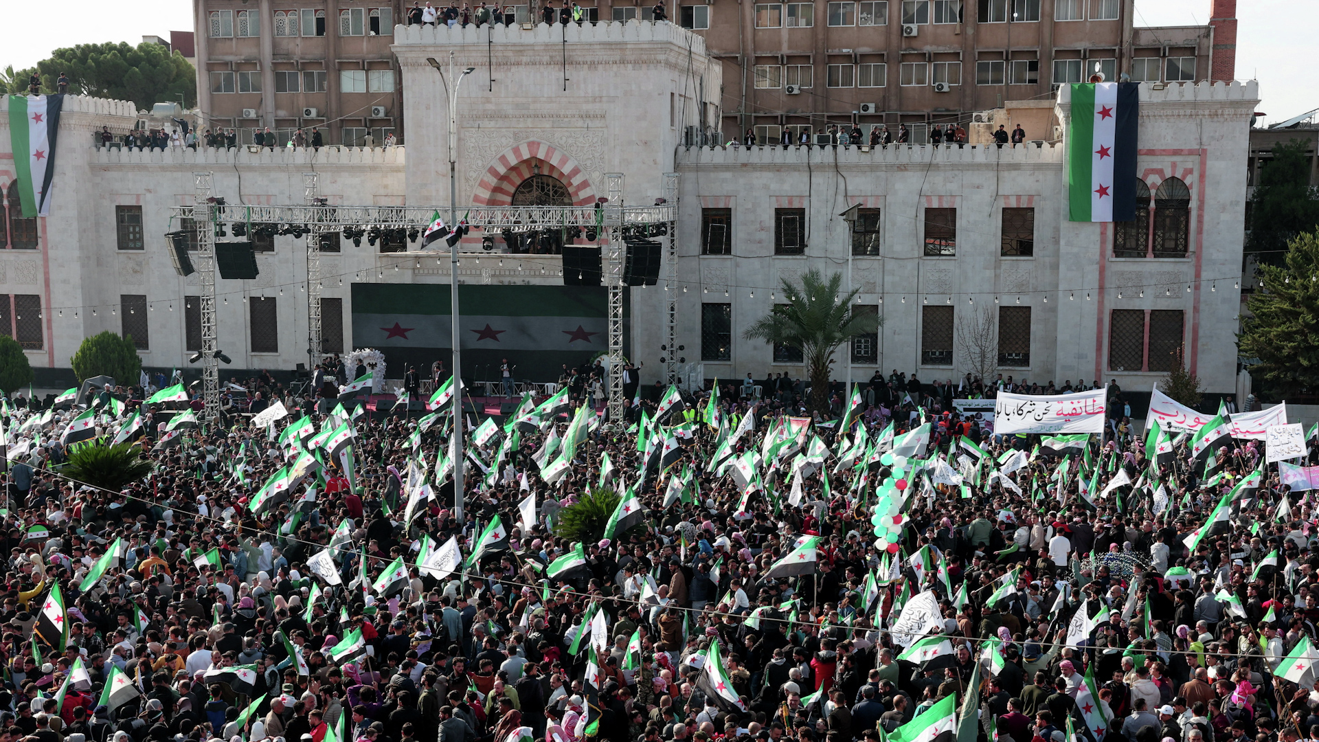 Crowds gather in Hama, Syria, to celebrate one year of liberation