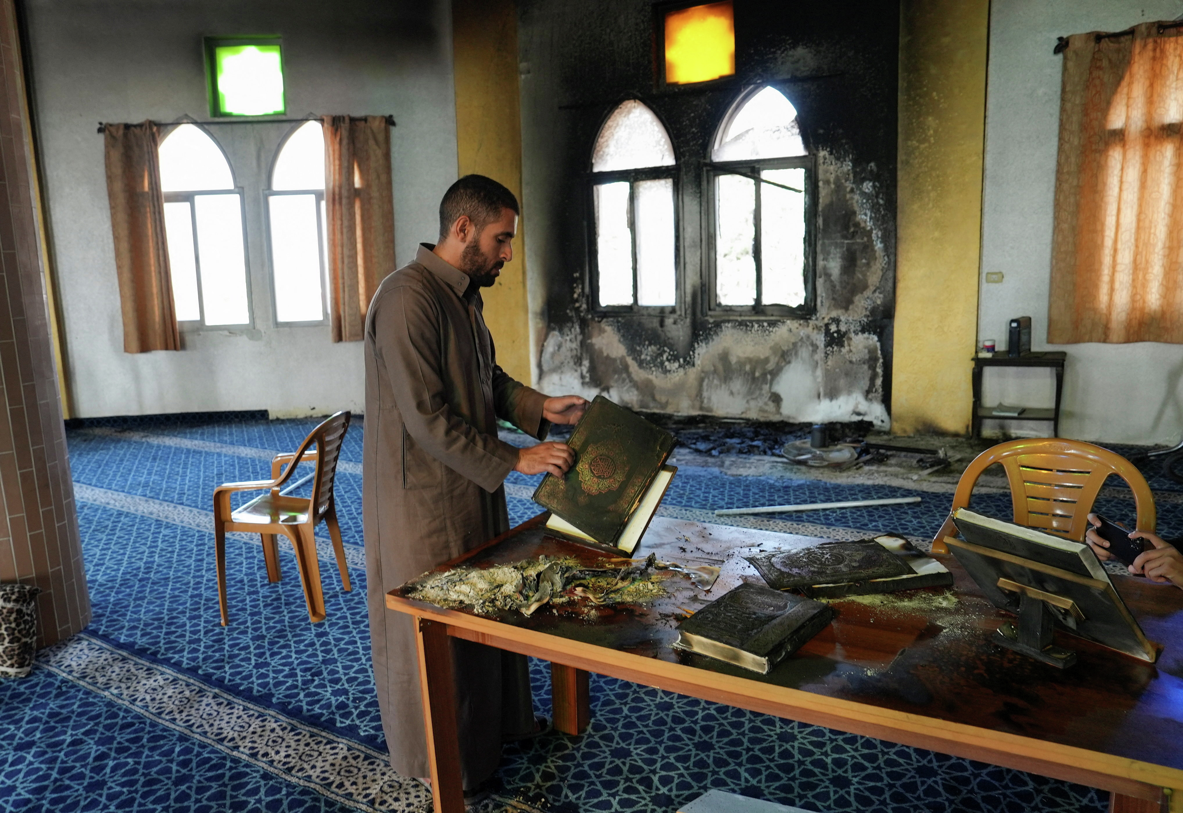 West Bank mosque torched amid surge in Israeli settler violence