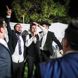 Israeli ultra-Orthodox dance at weddings, while praying for the sick
