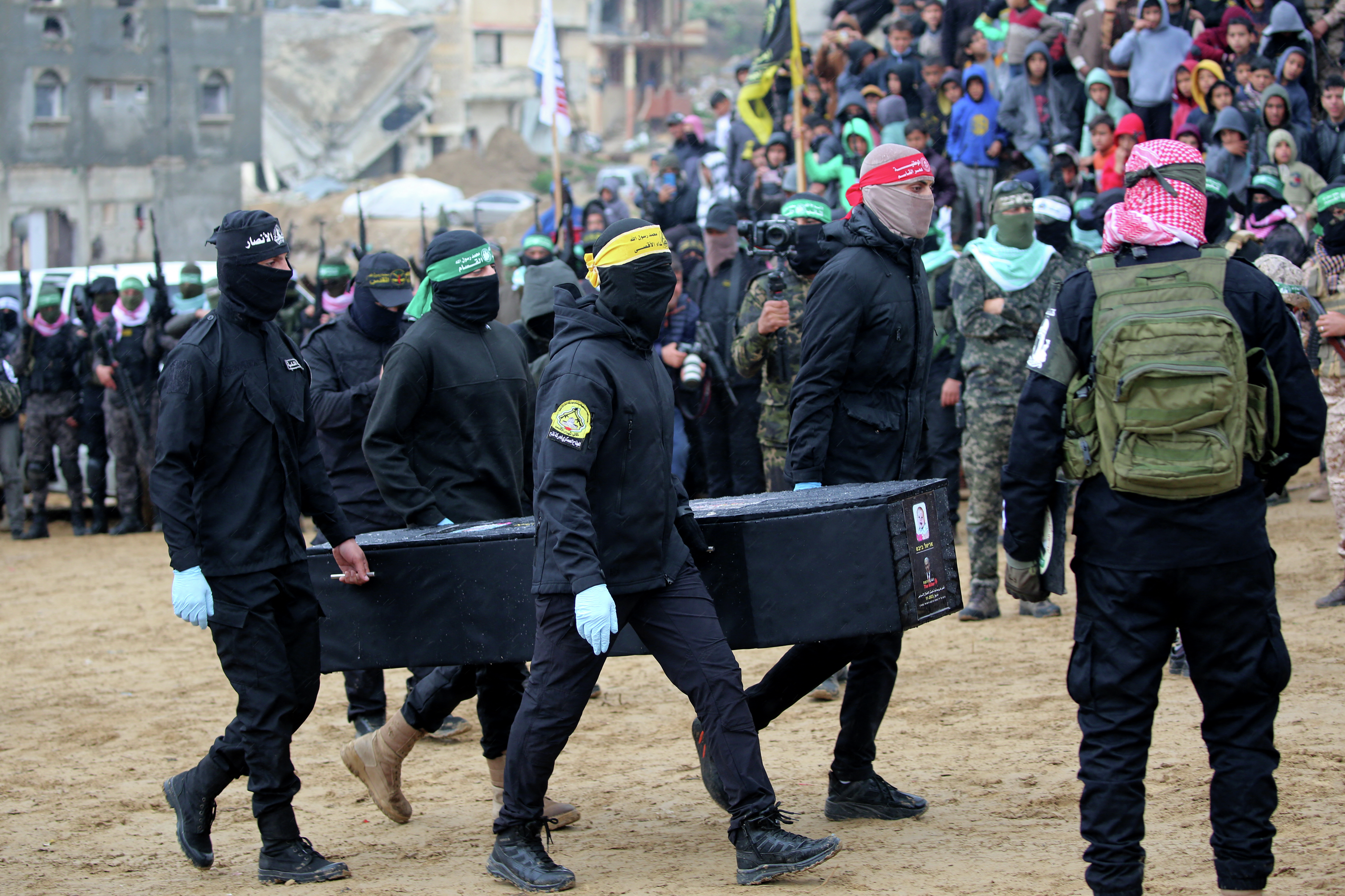 Day 503 - In grotesque 'ceremony,' Hamas hands over 4 coffins