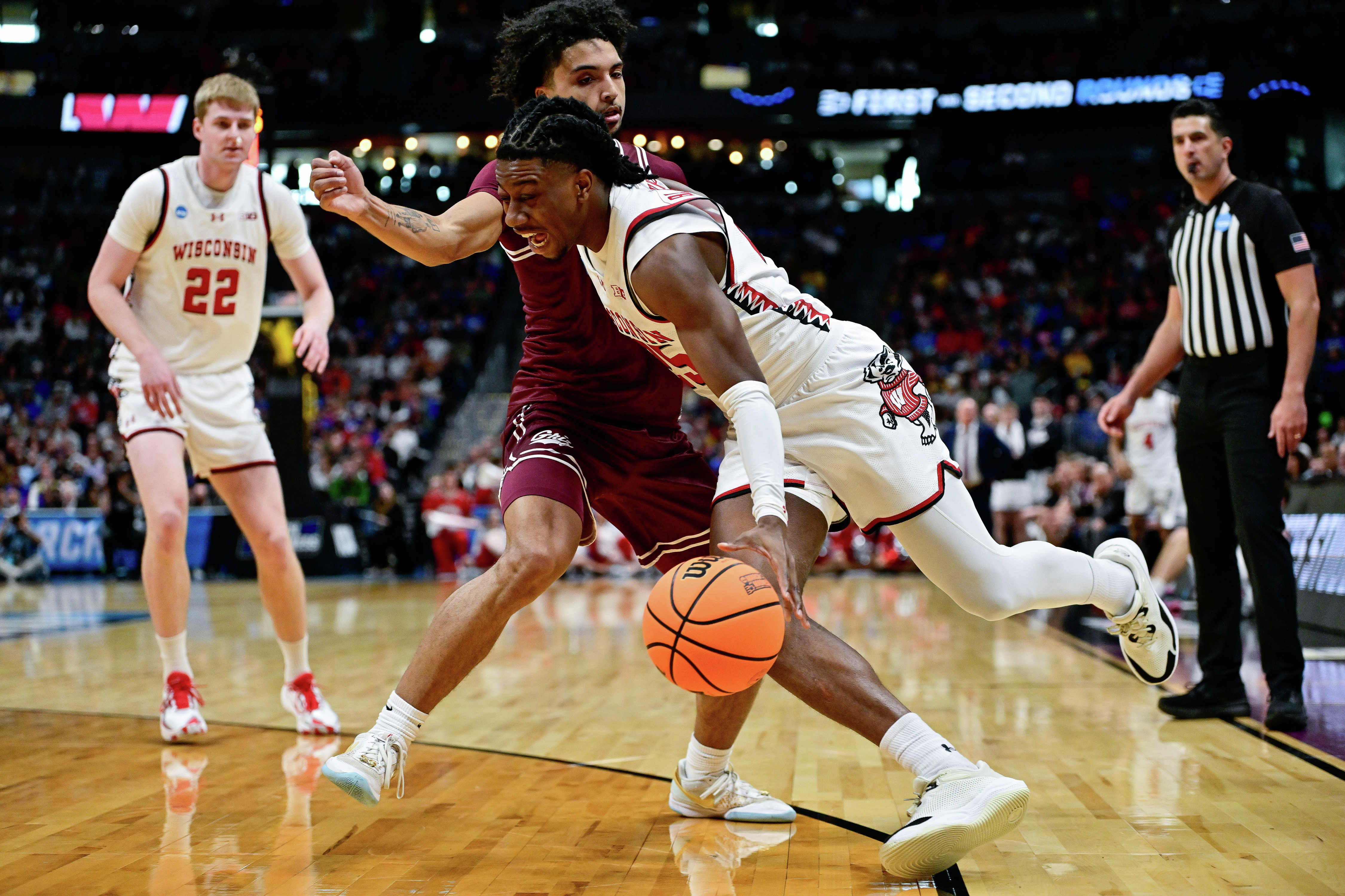 Wisconsin beats Montana 85-66, moving onto the second round