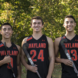 These boys are playing on Wayland High's field hockey team