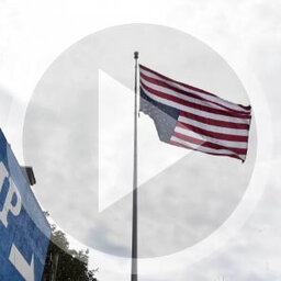 LISTEN: Public upset over Walton business' decision to fly American flag upside down