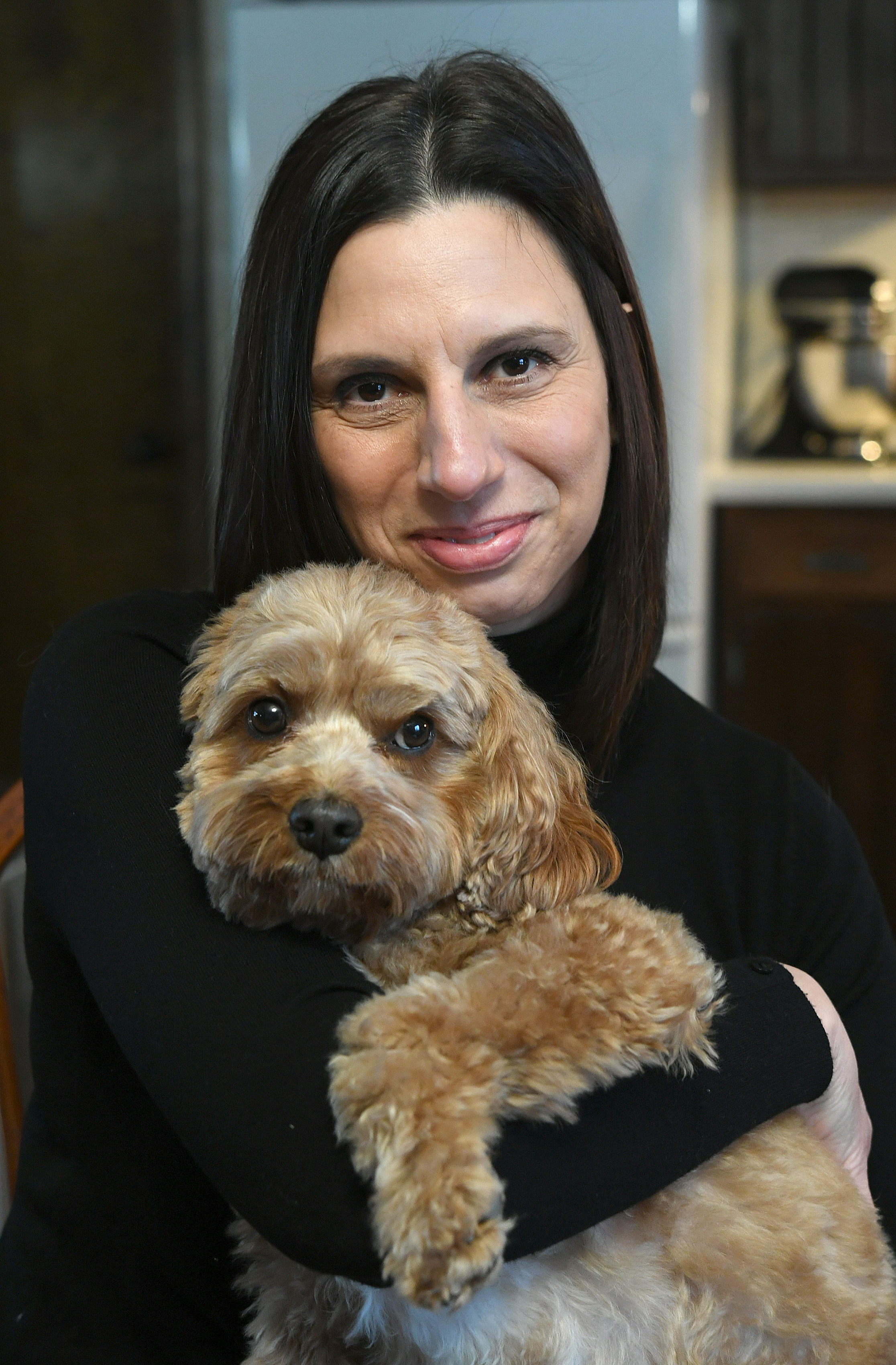 Nancy Russo and Murphy are volunteers of the year for Therapy Dogs United in Erie