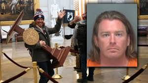 Adam Johnson, Manatee County man accused of taking lectern during U.S. Capitol riot, appears in federal court