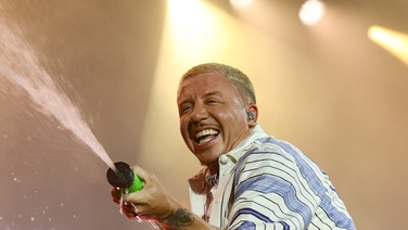 Macklemore dropped from Ed Sheeran's US tour episode artwork