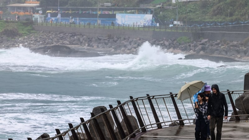 Typhoon forces evacuations in Taiwan as death toll rises in Philippines