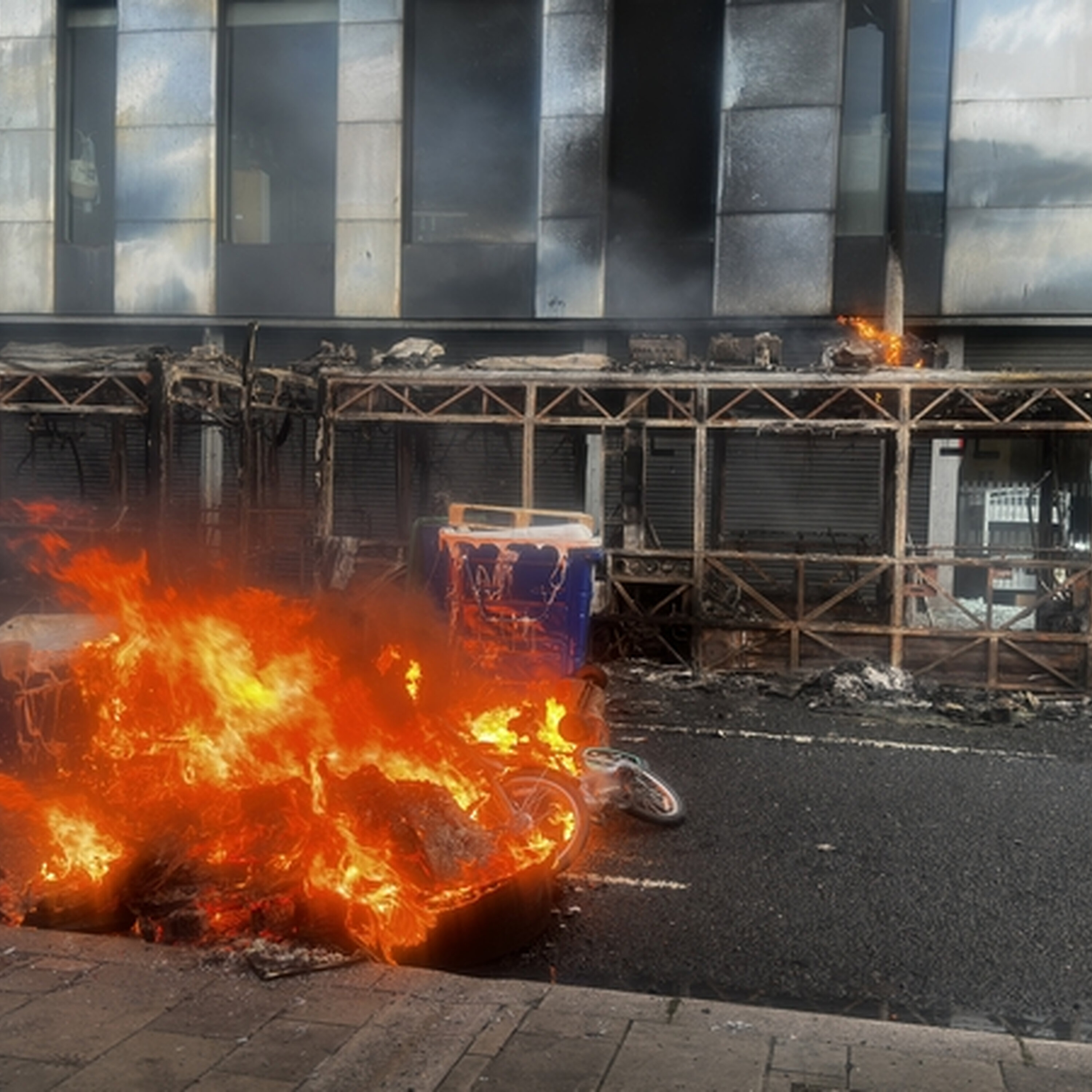"I seen our shop burning on the news"