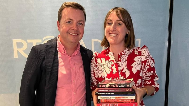 Catherine Prasifka with books to get you back reading