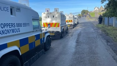 Orange order vows to march down the Garvaghy road and talks take place in Hillsbough