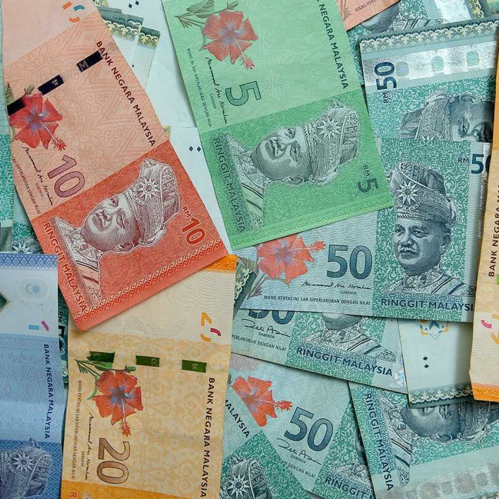 令吉汇率直直落 黄锦荣： 贬值等同鼓励出口是迷思